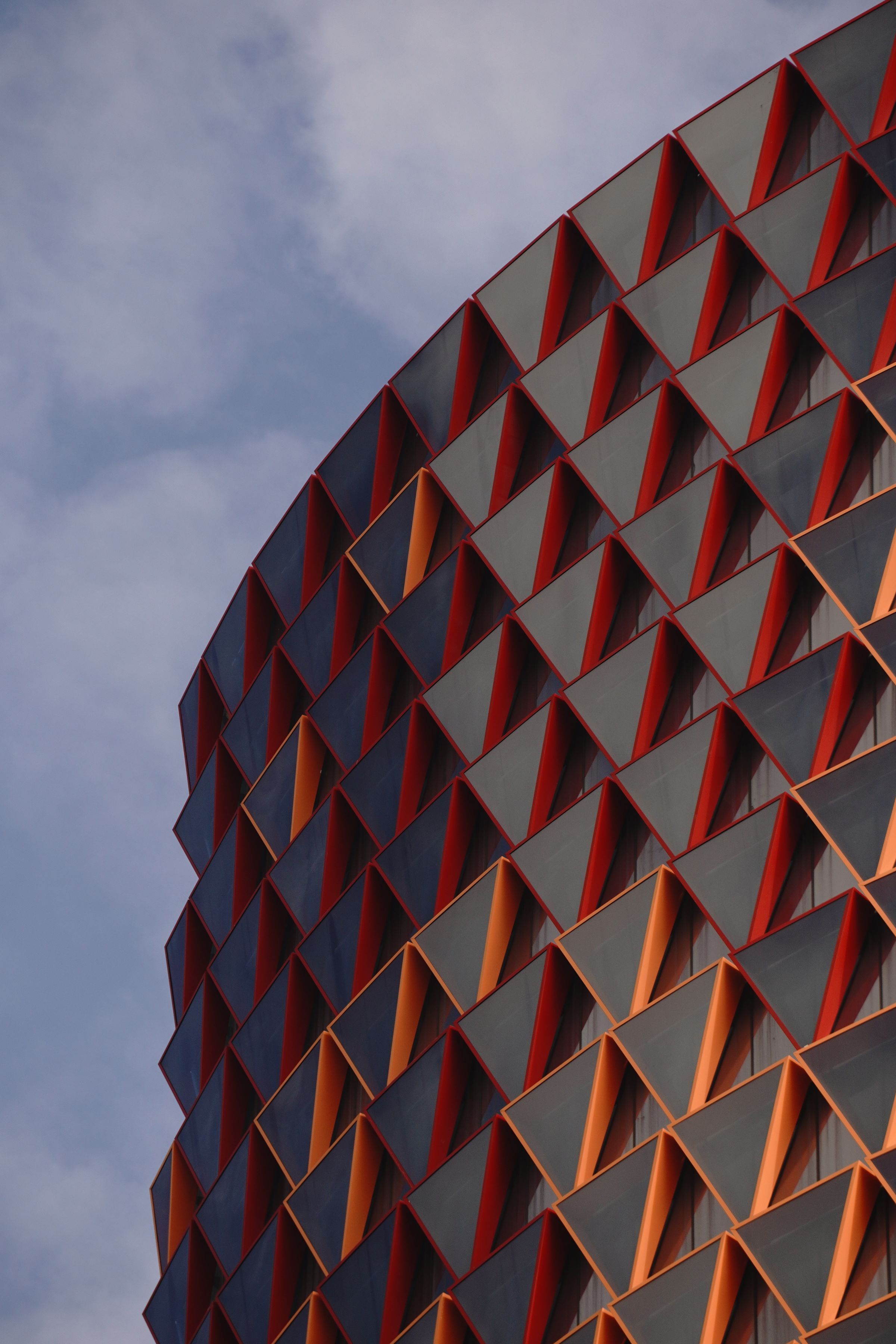 Red, orange and gray geometric architectural facade
